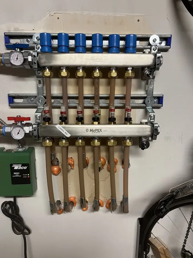 Plumber performing Water Heater Repair at a residential property in Dupo